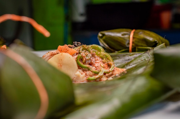 Preparation of the nacatamal, close up of the elaboration of a Nicaraguan nacatamal