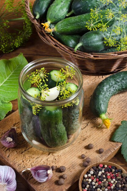 Preparation for pickling cucumbers with spices and herbs. Top view. Ð¡lose-up. Rustic style.