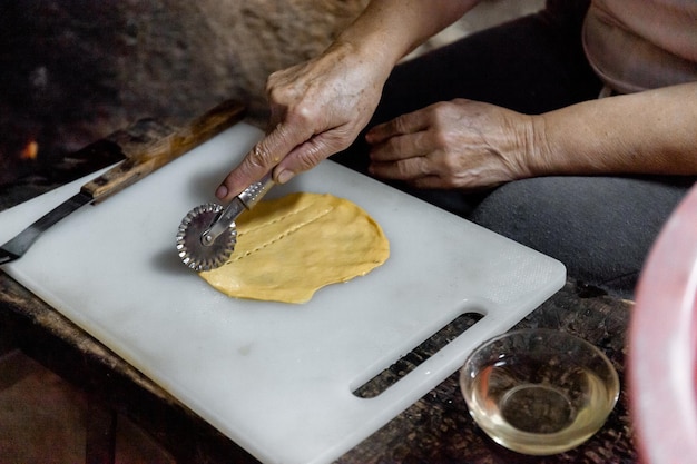 Photo the preparation of a traditional food sweet fritter called filhos from portugal christmas time