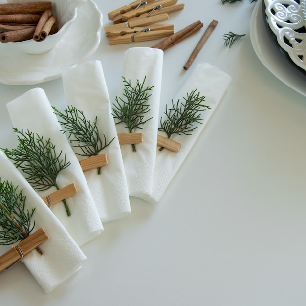 Preparations about arranging the table for winter holidays. Winter decoration, DIY