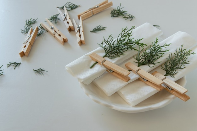 Preparations about arranging the table for winter holidays. Winter decoration, DIY