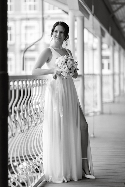 Preparations for the bride with the dressing of the wedding dress