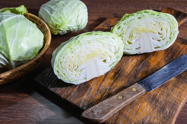 Prepare the cabbage to cook on the kitchen table.