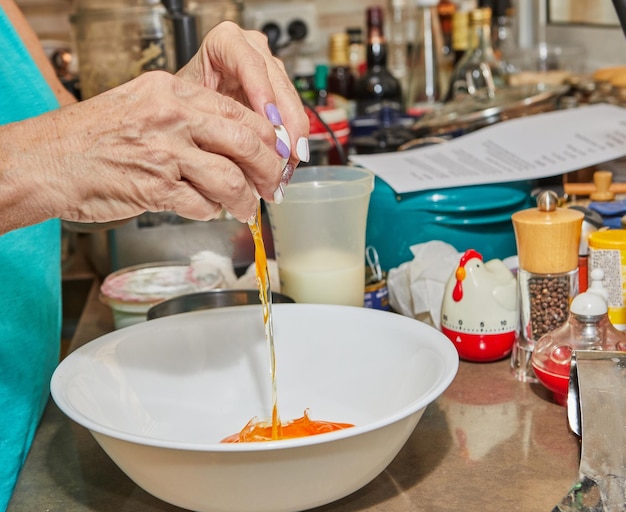 To prepare the dish the chef beats the yolk and white