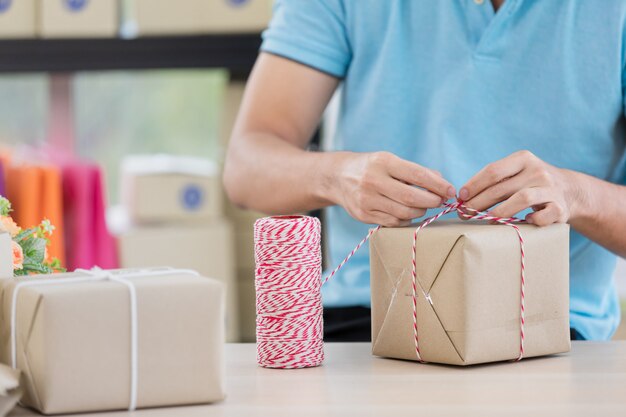 Prepare merchandise boxes from home base business.