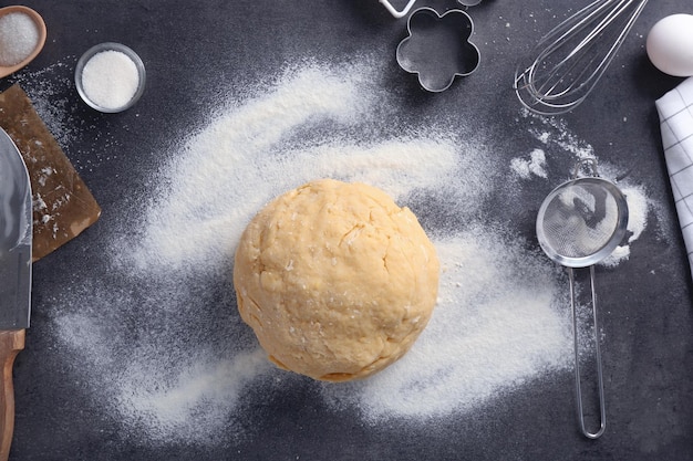 Photo prepared dough for butter cookies on kitchen table