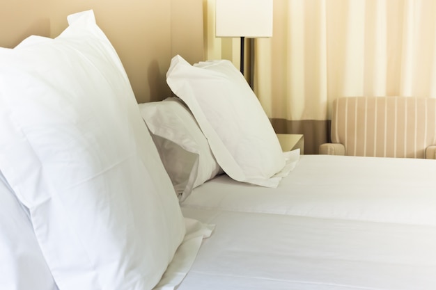 Photo prepared fresh bed, scene in hotel room. horizontal shot