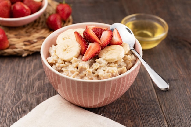 Prepared oatmeal with fruits and berries