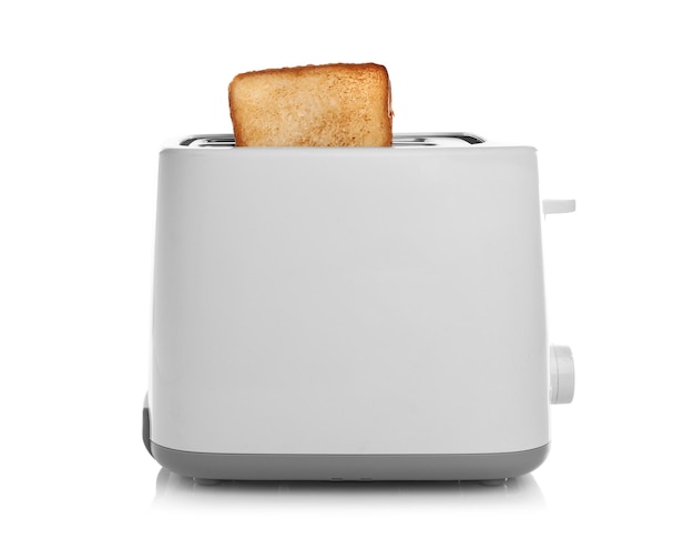 Photo preparing bread in toaster on white background