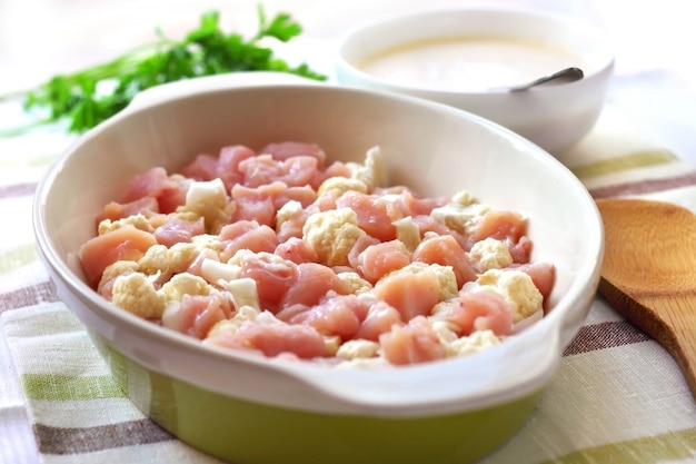 Preparing chicken breast and cauliflower casserole