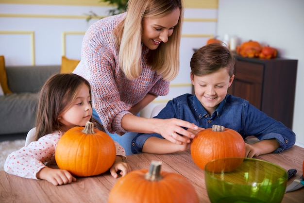 Preparing decorations for Halloween time by family