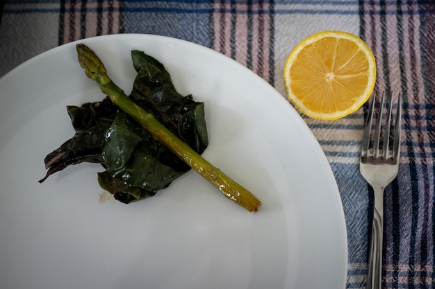 Preparing delicious food  on plate at table