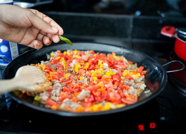 Photo preparing delicious food with meat and vegetables