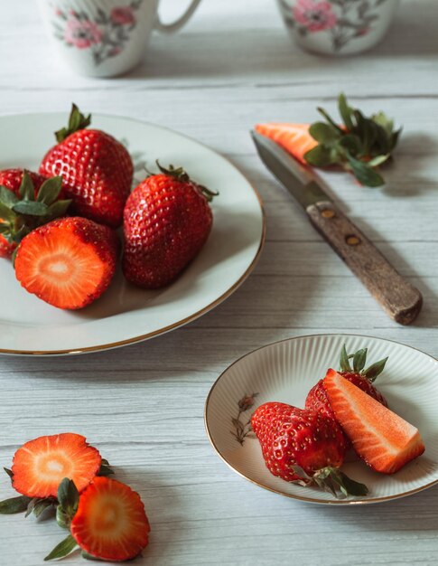 Preparing a dessert with strawberries