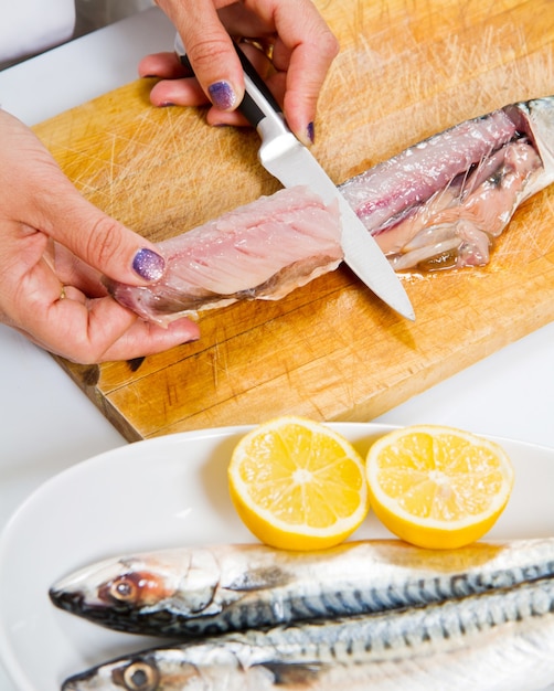 Preparing fillet of meckerel