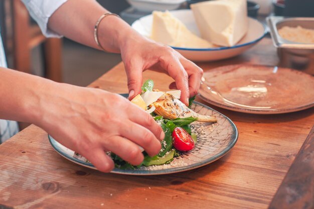 Preparing food presentation human hand