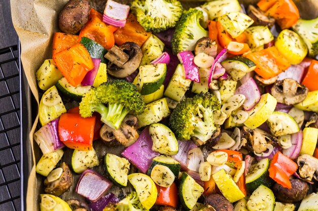 Preparing fresh roasted mixed vegetables for dinner.