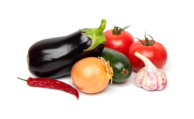 Preparing Healthy Food Vegeterian Vegan Concept A set of fresh whole vegetables zucchini eggplant tomatoes onion chili pepper and garlic