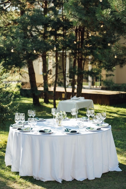 Preparing for an openair party Decorated served tables await guests Decoration Details
