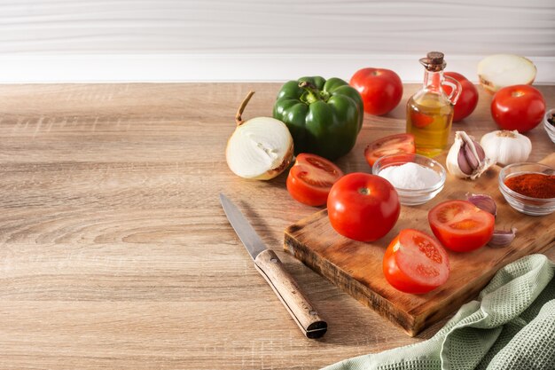 Preparing tomato sauce in the kitchen. Ingredients on the kitchen counter