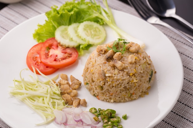 prepered fish with rice on the white plate