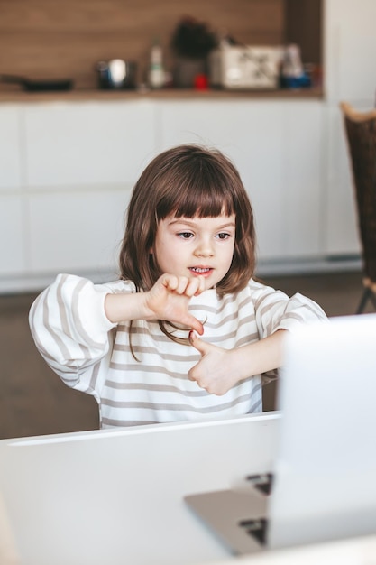 Preschooler doing an online finger gymnastics