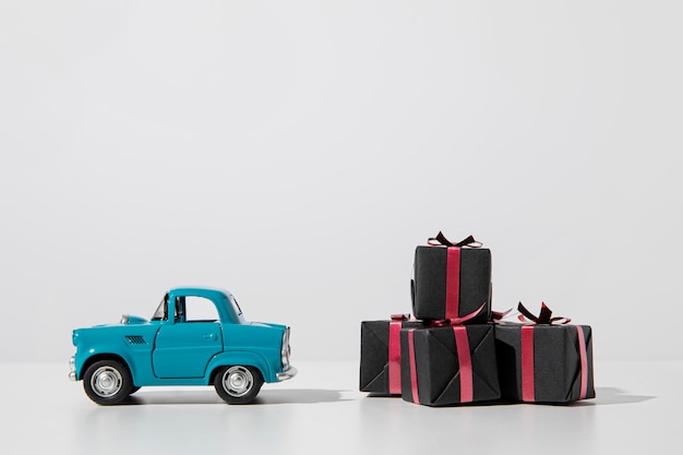 Present boxes and blue car toy