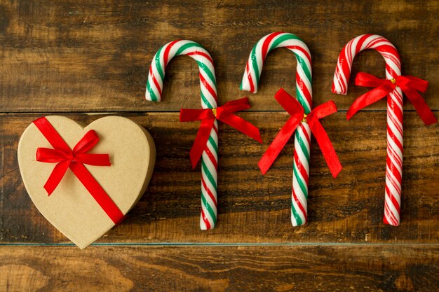 Present for Christmas and Candy Canes with ribbon 