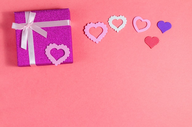 Present gift for Valentine day on pink background