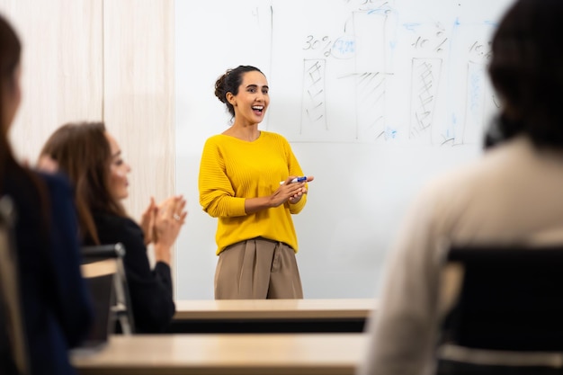 Presentation business woman people giving presentation and Report pointing at projector or TV screen People Work in Business Office