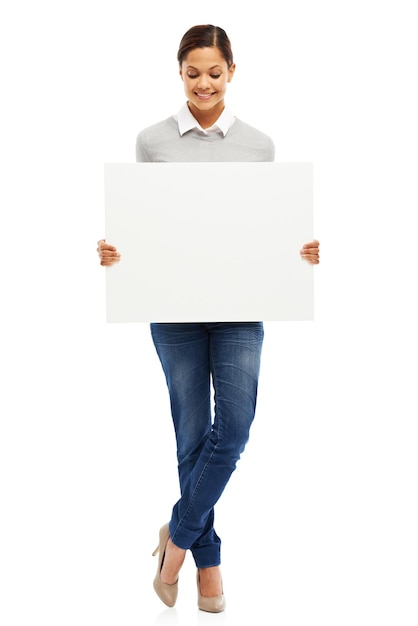 Presenting your message Studio portrait of an attractive young woman holding a blank placard isolated on white