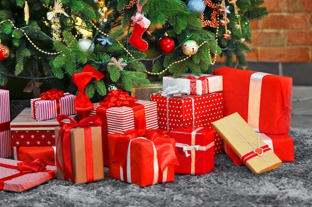 Presents under the Christmas tree on floor