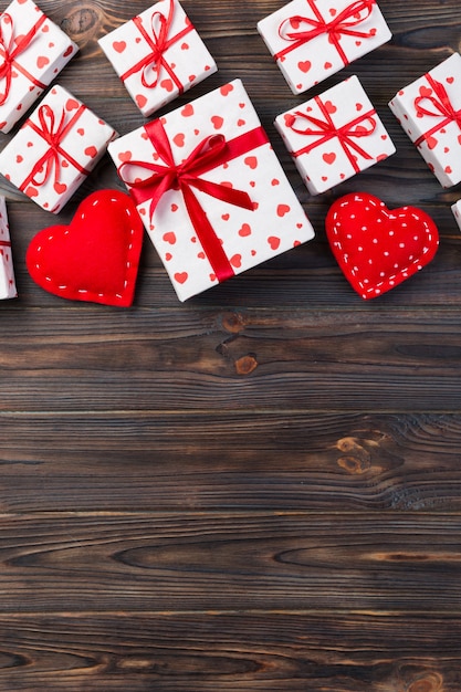 presents and textile hearts on wood