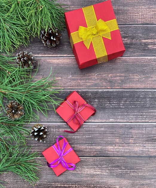 presents with a Christmas tree on a wooden background. banner for new year and hristmas.