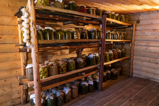 Photo preservation salting in large jars stocks for winter preservation of fruits and vegetables for the winter canned food in glass jars