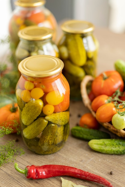 Preservation of tomatoes and cucumbers, the harvest is salted in jars