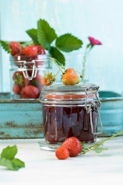 Preserving jar of homemade strawberry jam