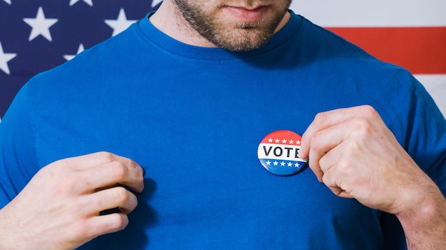 Presidential election button on a man