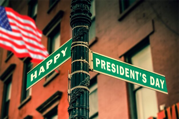 Photo presidents day sign on a pole