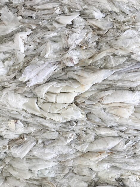 Pressed transparent plastic bags. waste. processing. ecology.