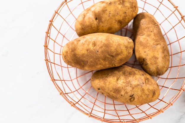 Photo pressure cooker baked potatoes