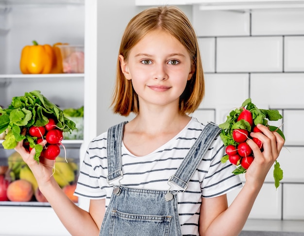 Preteen girl at kitchen