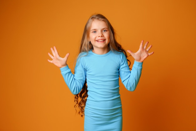 Premium Photo | Preteen girl smiling with blue fashion dress