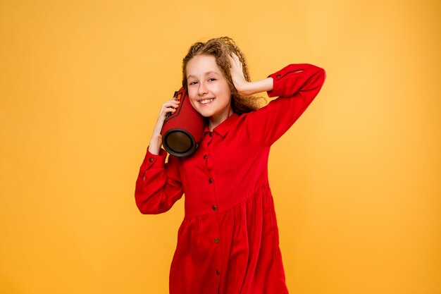 Preteen girl with partitional column dancing