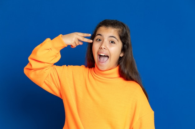 Preteen girl with yellow sweatshirt