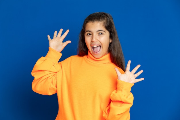 Preteen girl with yellow sweatshirt