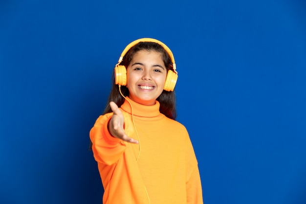 Preteen girl with yellow sweatshirt