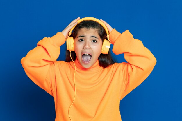 Preteen girl with yellow sweatshirt