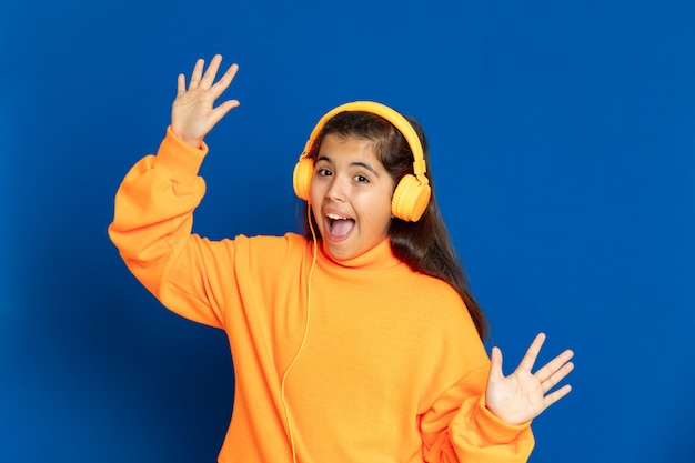 Preteen girl with yellow sweatshirt