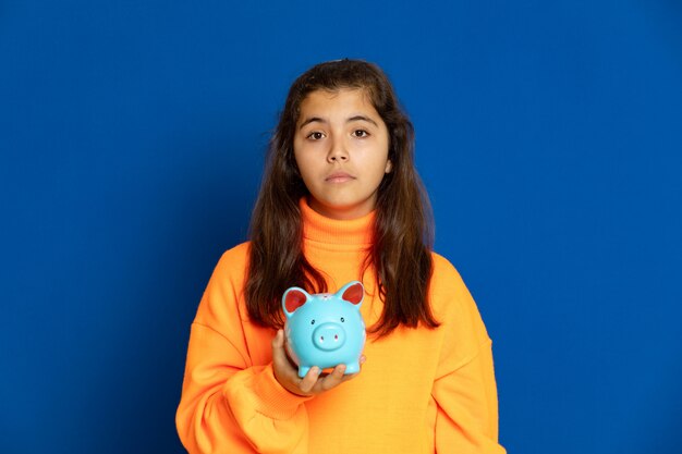 Preteen girl with yellow sweatshirt